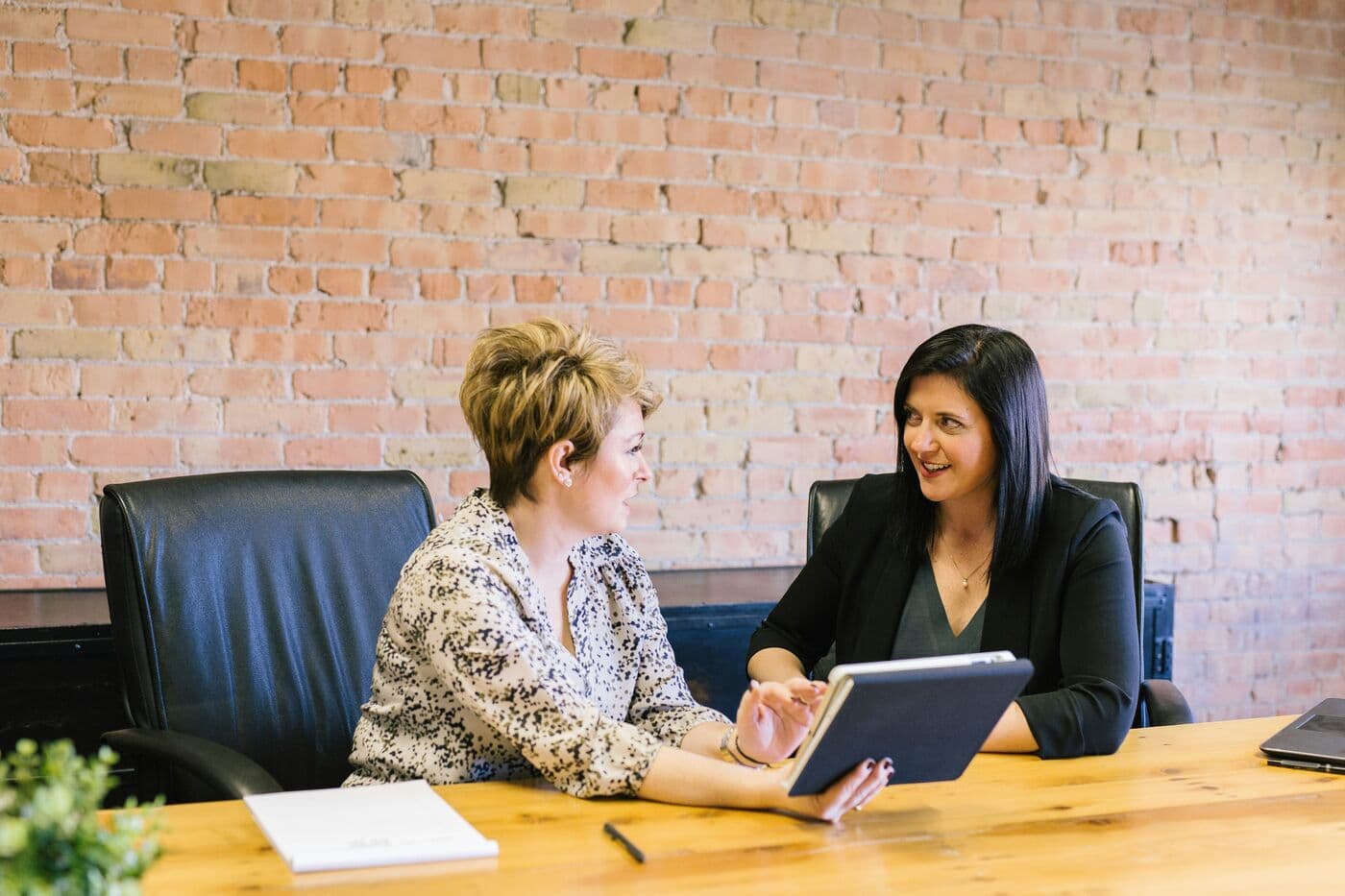 A manager and an employee in a private one-to-one conversation